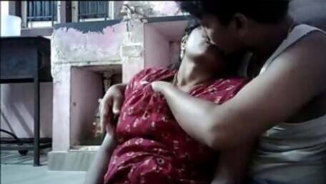 Indianwife kissing and boobs pressing